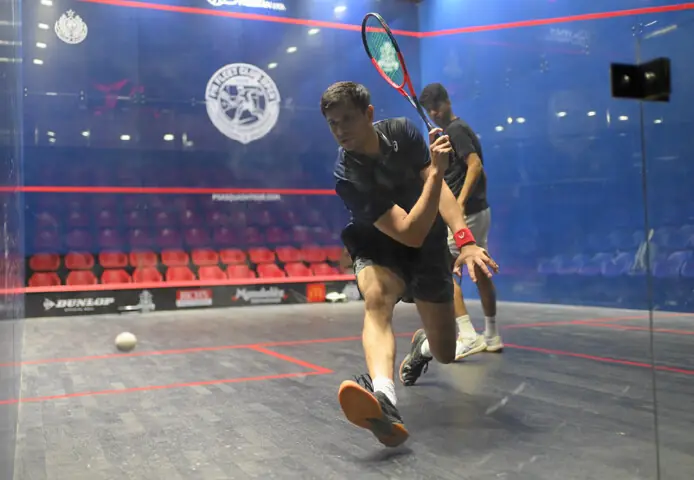 Asim Khan Stuns Top Seed Noor Zaman to Advance in Pakistan Navy Fleet Club Open Squash Championship
