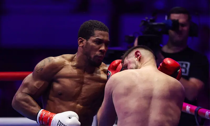 Anthony Joshua Triumphs Over Kristian Prenga, Eyes Tyson Fury Showdown