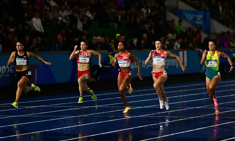Emmanuel Eseme and Zoe Hobbs Claim Gold in Rain-Soaked Commonwealth Games
